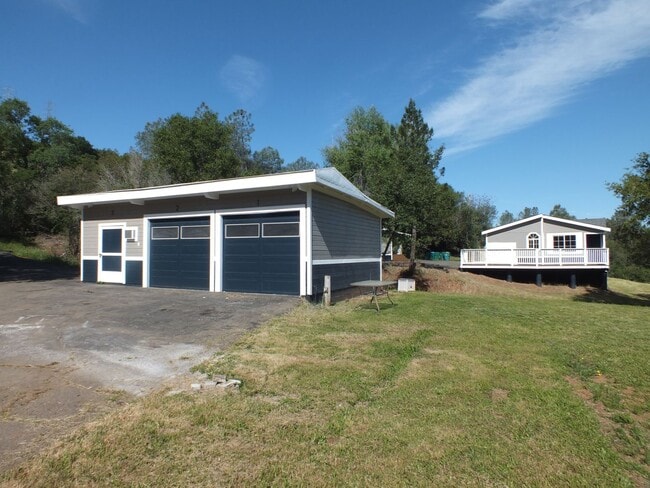 Building Photo - Rescue 4/3 retreat - includes separate cottage/office, 2 garage bays, RV pad and 5 acres with Sie...
