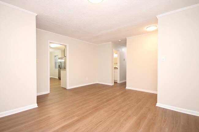 Building Photo - Fully Renovated 3BR/2BA Molino Home on a Spacious Lot Featuring Multiple Living Areas, Sunroom & ...