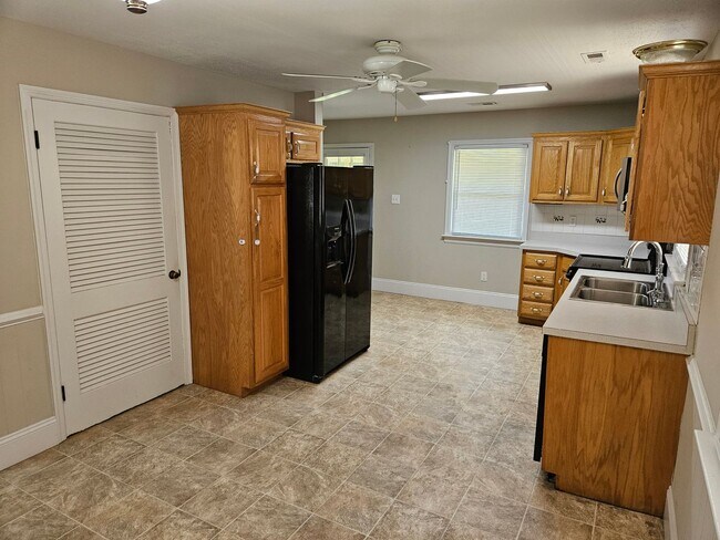 Building Photo - Charming Brick Rancher on Massive Lot – Move-In Ready!
