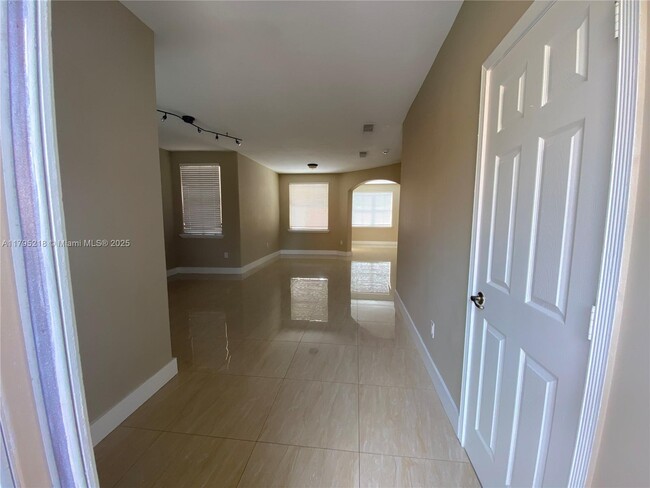 Building Photo - 4890 NW 108th Pl