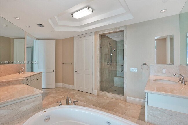 Building Photo - 10295 Collins Ave