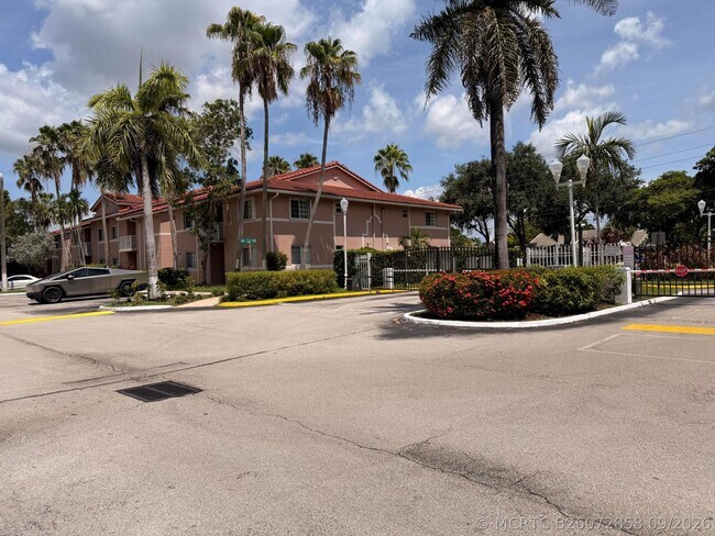 Building Photo - 3271 Sabal Palm Manor