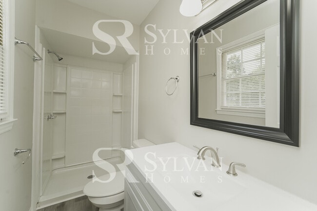 Building Photo - Feel welcome and comfortable in this charming home