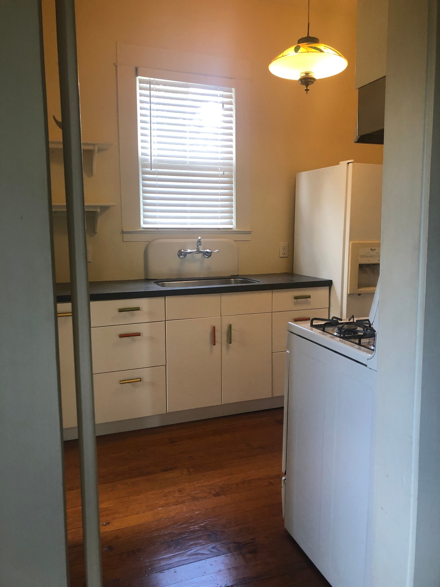 Kitchen, gas stove, new refrigerator - 704 E Guenther St
