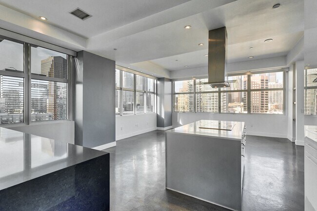 Our renovated kitchens feature beautiful solid surface counters - Renaissance Tower