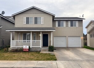 Building Photo - 4 bed, 2.5 ba - Golf Course living in Horn Rapids