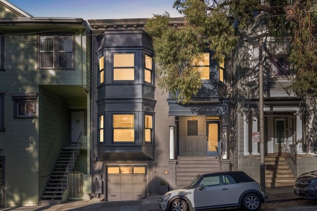 Building Photo - Bernal Heights: Remodeled Unfurnished Top Floor Condo w/ Garage Parking & Shared Yard