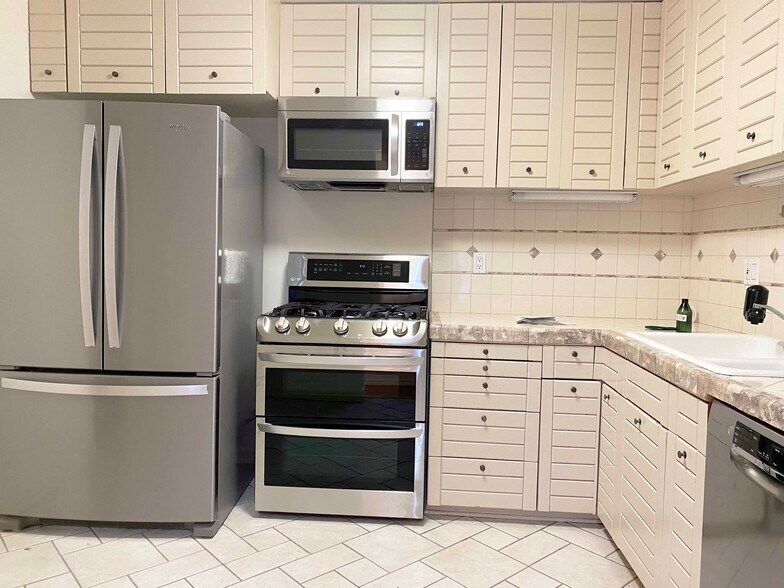 Kitchen with huge refridgerator - 21980 Alta Dr