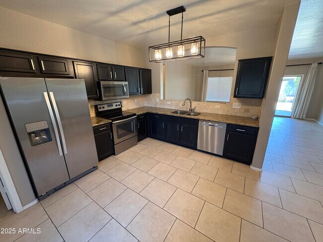 Building Photo - 17848 W Acapulco Ln