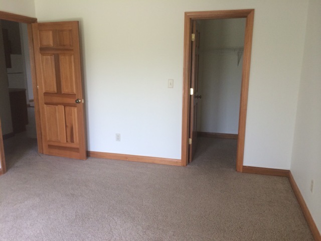 Master bedroom with walk in closet - 2237 Shamrock Ln