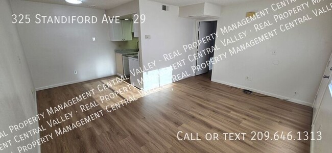 Building Photo - SPACIOUS 1 BEDROOM 1 BATH CONDO