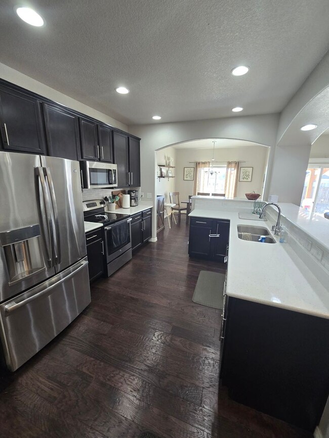 Building Photo - Spacious 4BR with Modern Upgrades and Comp...