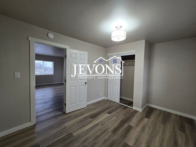 Building Photo - 3 bedroom home with washer and dryer – 1-acre lot next to an orchard – Large and small pets allowed!