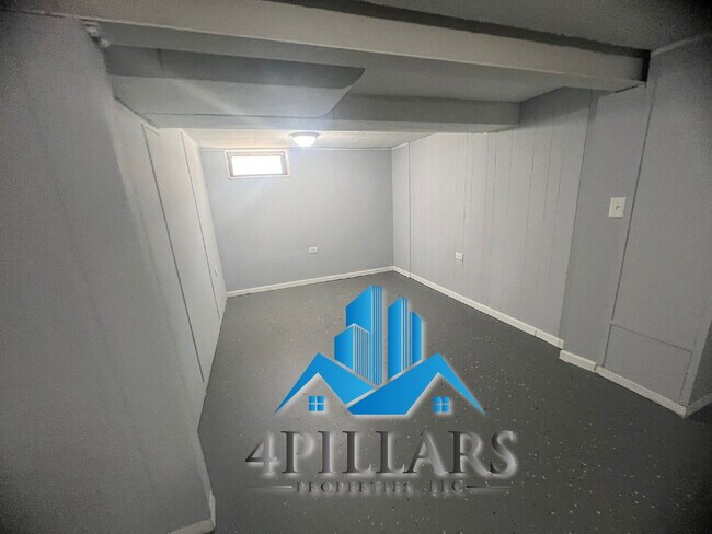 Building Photo - "Charming 2-Bedroom Gem with Finished Basement & Gleaming Hardwood Floors in Hammond!"