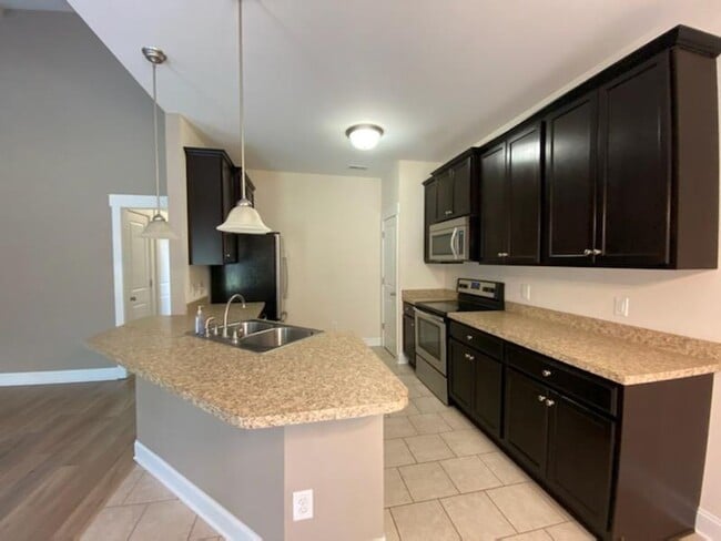 Building Photo - 3 Bed, 2 Bath unfurnished home with Bonus room in Escoba Bay!