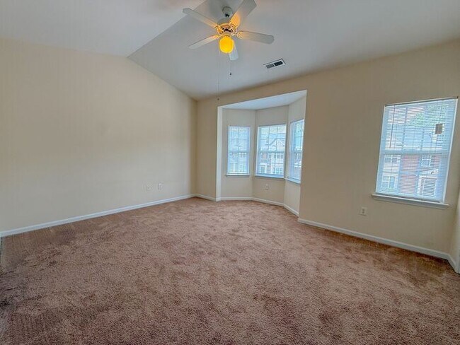 Building Photo - Beautifully updated Townhome! New cabinets, granite counter tops, and LVP flooring through downst...