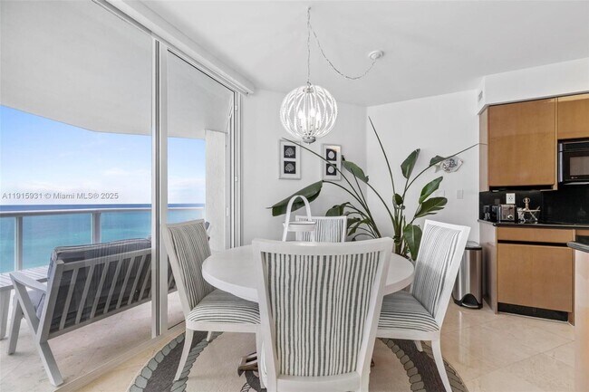 Building Photo - 18671 Collins Ave