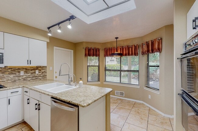 Building Photo - ACADEMY RIDGE 2 Bedroom Plus Office   2 Ba...