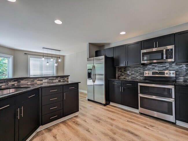 Building Photo - Beautifully maintained move-in ready 4-bed, 2.5-bath home with upgrades throughout!