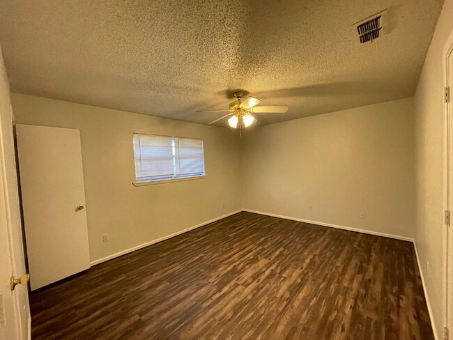 Building Photo - Updated South Lubbock Duplex — Spacious 2BD/1.5BA with Private Yard & Modern Finishes