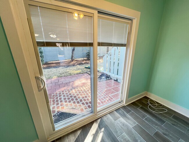 Building Photo - Stunning and Spacious 2 Bedroom, 2.5 Bath, Town Home With Sunroom and Deck!