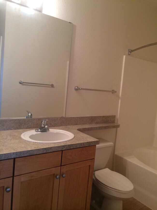 Building Photo - Modern 2-Bedroom in Eden Prairie with Heated Parking and Resort-Style Amenities