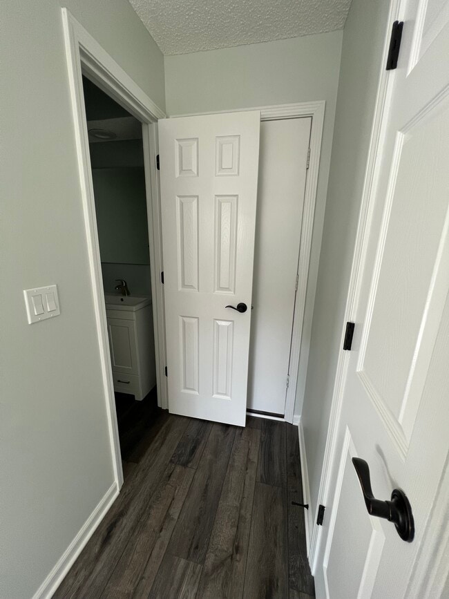 Half bathroom/garage door/pantry/back hallway - 14103 W 88th Terrace