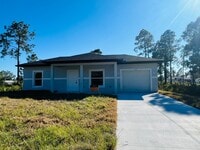 Building Photo - ONE OF A KIND! BRAND NEW 1 Bedroom-1 Bath- 1 Car Garage in Desirable Lehigh Acres!