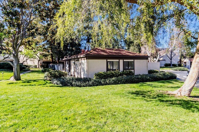 Building Photo - Stylish End-Unit Condo l Private Patio l Community Pool