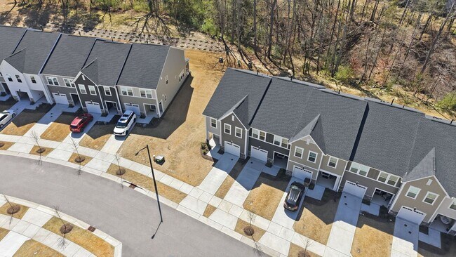 Building Photo - Upgraded 3BR Townhome in Wake Forest | Open Layout, Garage & Resort-Style Amenities