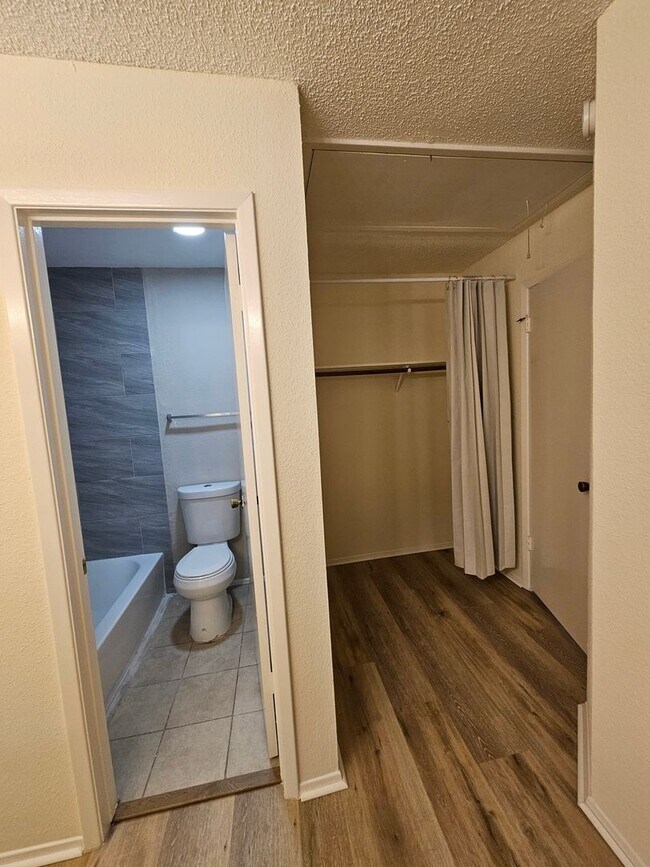 Building Photo - Beautifully Updated 2BR/2BA with Loft Oasis – Safe & Gated Community