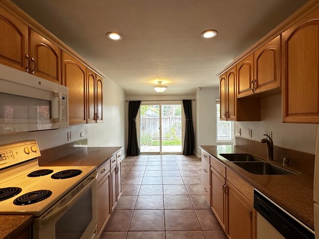 Building Photo - Single Story townhome, water/sewer paid by...