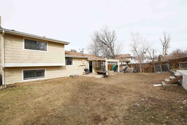 Building Photo - Fenced Backyard!