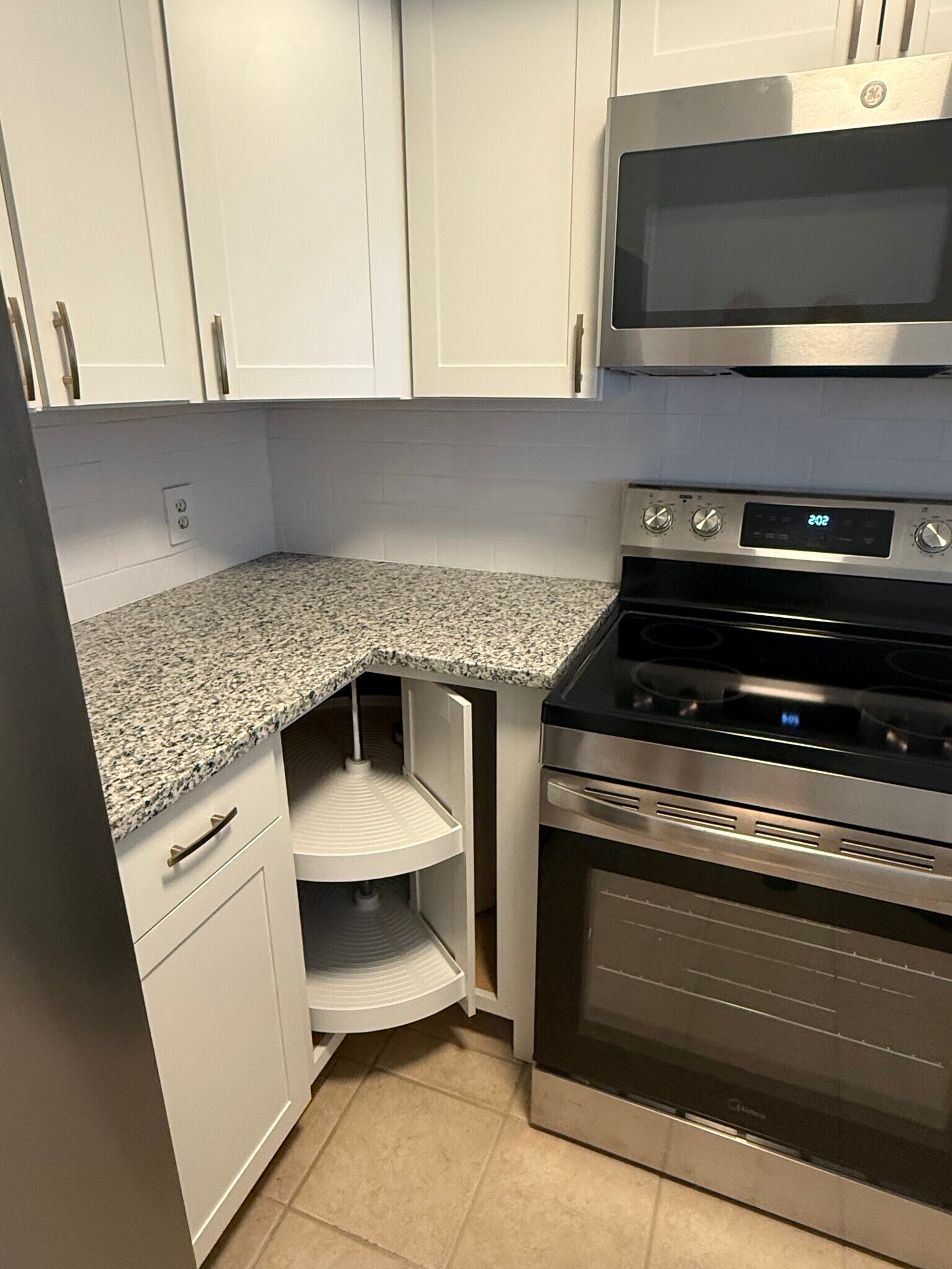 Corner cabinet with turntable. - 2301 Basil Dr