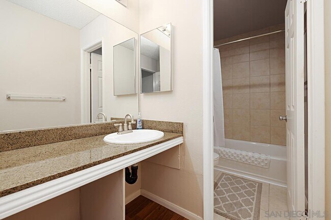 Building Photo - 7455 Charmant Dr