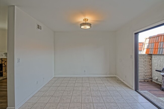 Building Photo - Bright & Airy, End-Unit 3BR2.5BA Townhouse w/ 2-Car Garage in Beautiful Gated Community w/ Pool &...