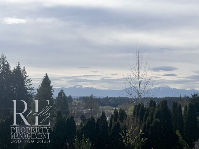 Building Photo - Private Retreat with Expansive Yard & Loft Space