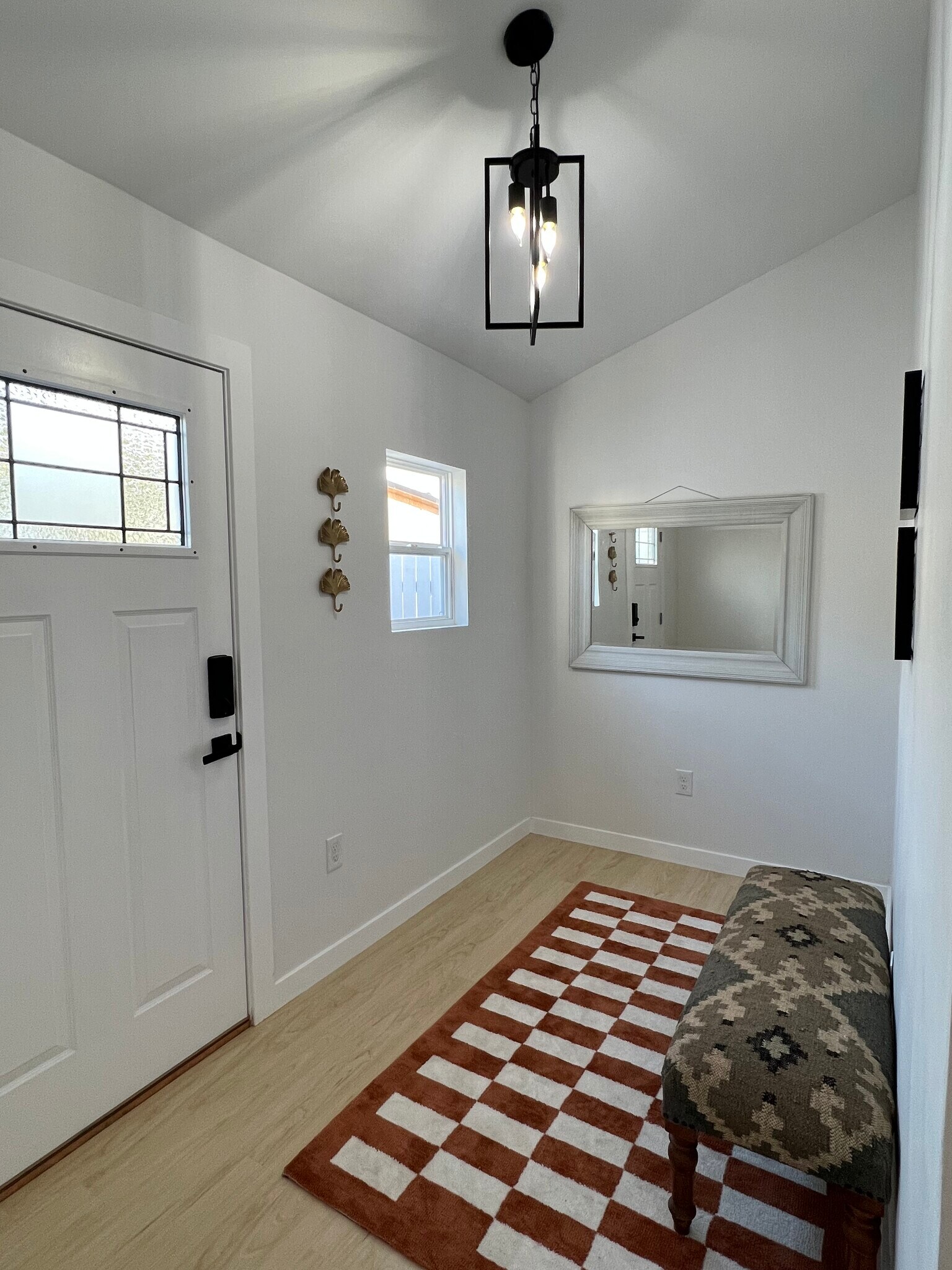 Bench in entrance. - 2016 N Ave