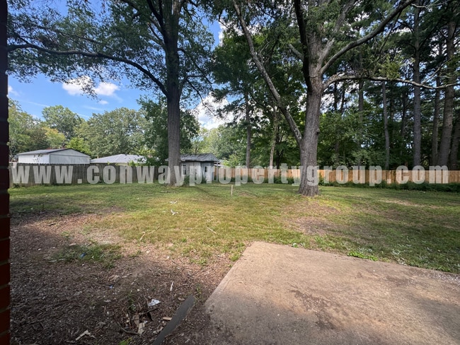 Building Photo - 718 S Donaghey Ave