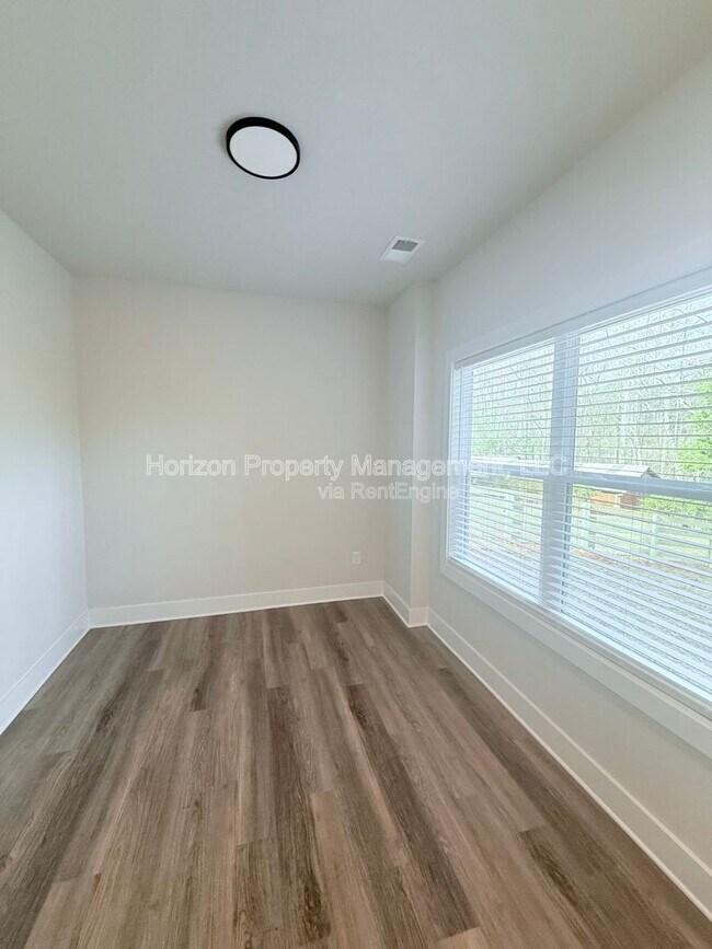 Building Photo - 7845 Wilkinson Dr