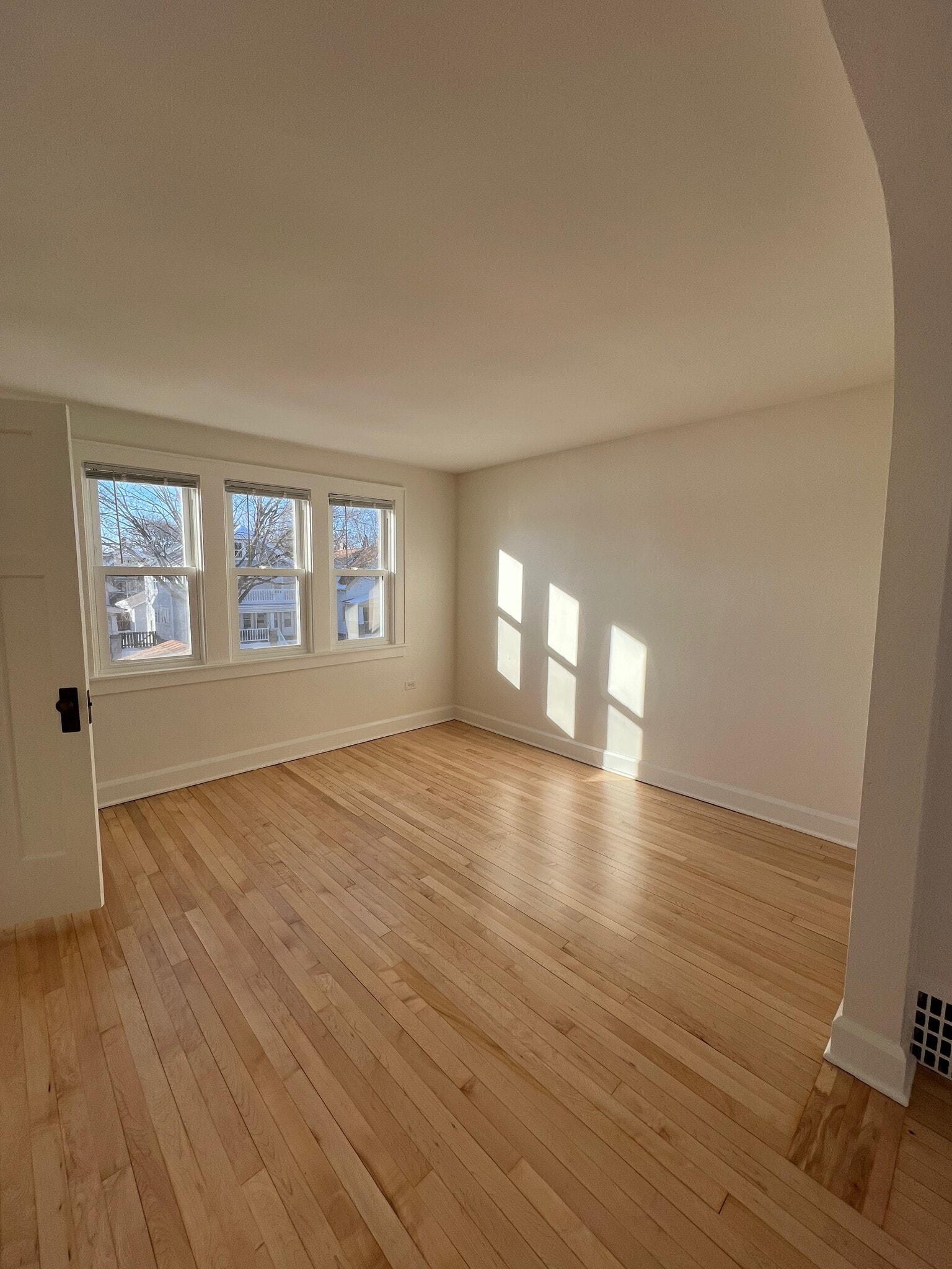 Living room with closet door open - 2706 E Morgan Ave