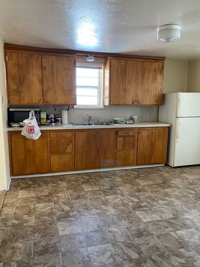 Building Photo - Cozy 2-Bedroom Home with Spacious Yard – C...