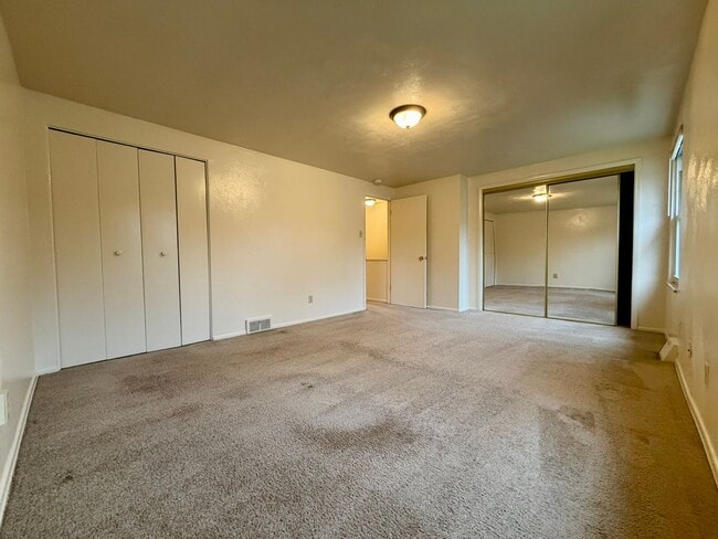 Building Photo - Stunning 2 BR Townhouse with Attached Garage! Central A/C & MORE!! CALL TODAY TO SCHEDULE A TOUR!