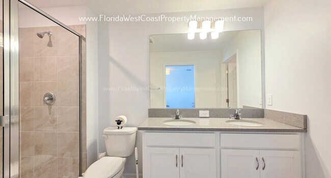 Building Photo - EXCEPTIONAL AND SPACIOUS FURNISHED TOWNHOME WITHIN WATERSIDE- NAUTIQUE!