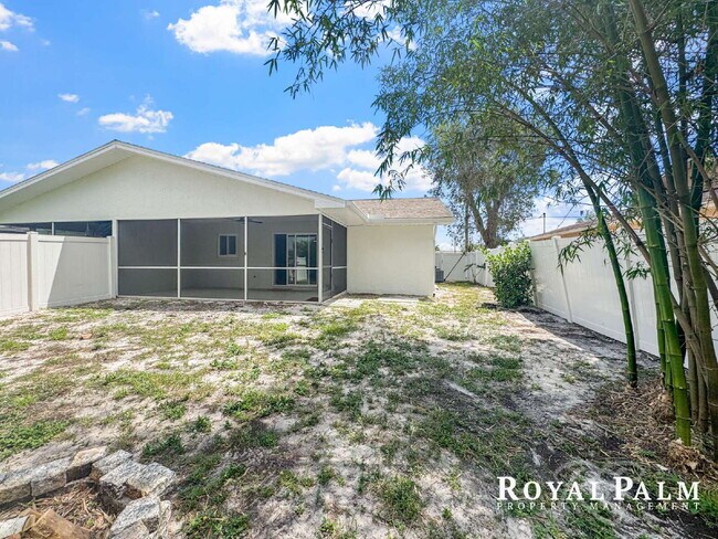 Building Photo - Tree-Lined 2BR/1BA Fort Myers Duplex with Fenced Yard, Storage Shed & In-Unit Laundry!