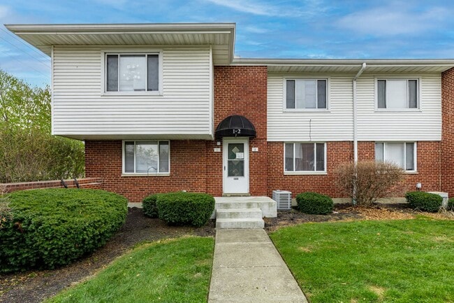 Building Photo - ???Move in Special: No Rent until January!!??? - 2BR/1BA Townhome with Attached Garage and W/D Ho...