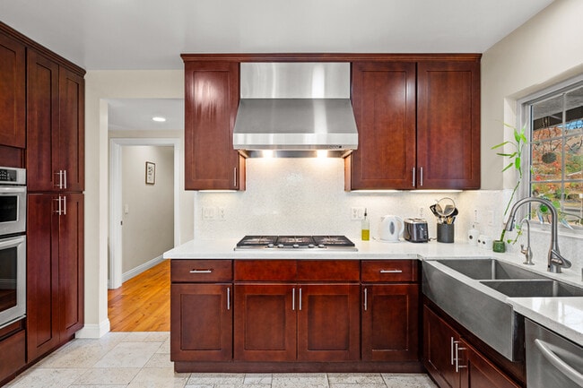 Building Photo - Luxury Estate with Sparkling Pool & Elegant Amenities