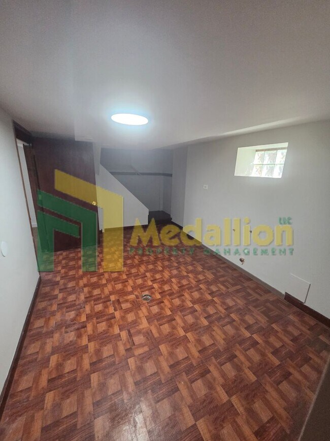 Building Photo - Spacious 6-Bedroom Home with Finished Basement and Backyard