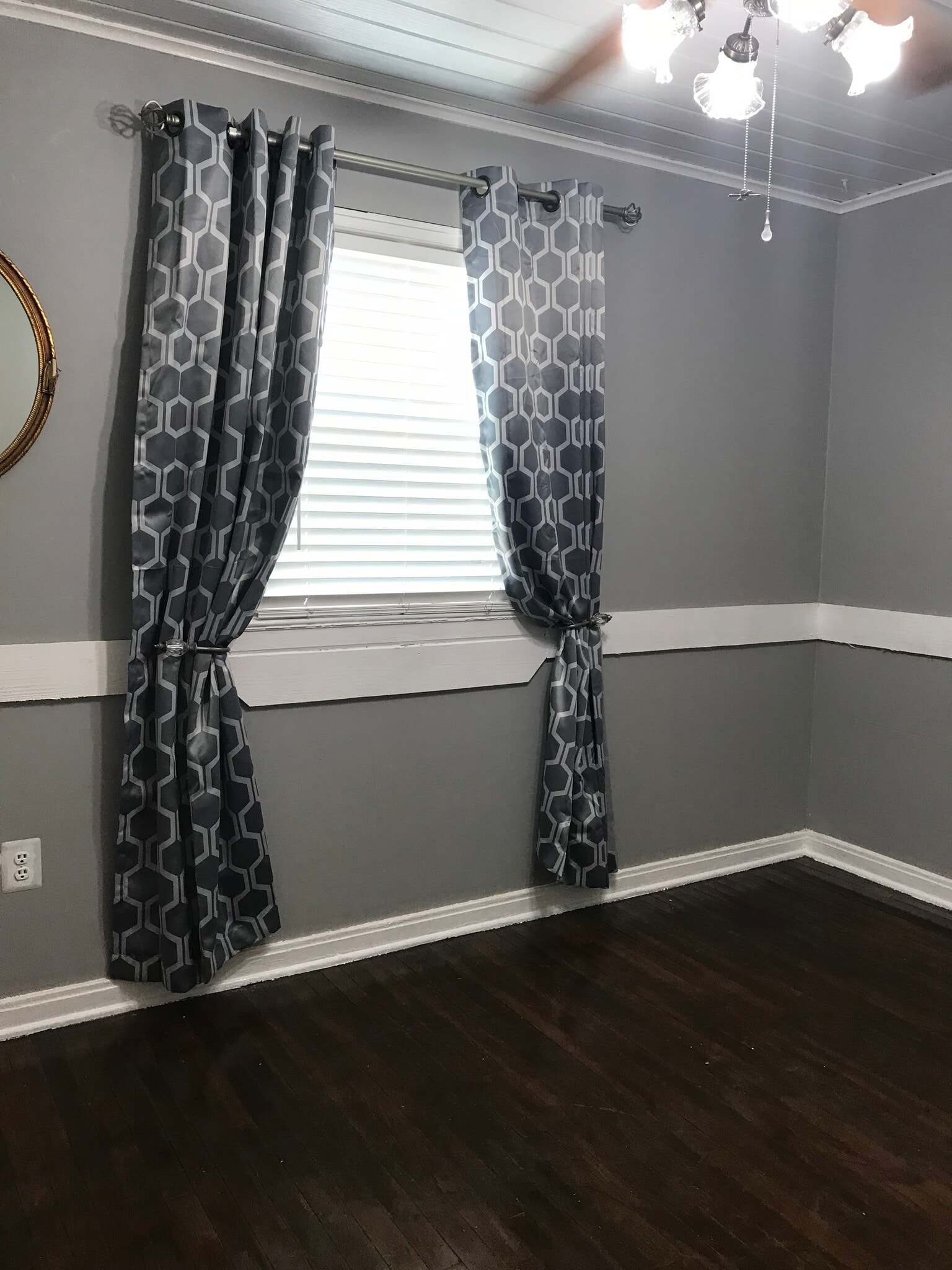 Wainscoting adds modern touch; light blocking designer curtains and rod - 1407 W Church St