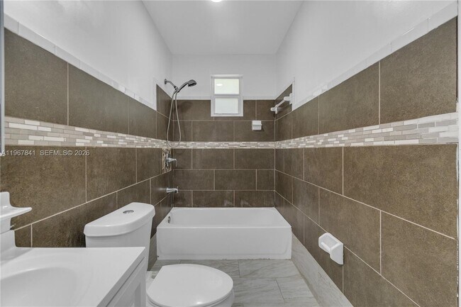 Building Photo - 6940 NW 6th Ct